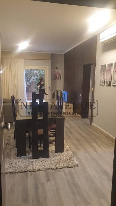 Ground floor studio with a private garden The village compound New Cairo prime location fully finished and equipped with appliances Ready to move