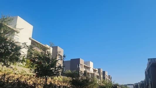Twin house for sale in Etapa Compound – Sheikh Zayed, within Phase 1, with a direct view of the project's largest landscaped area.