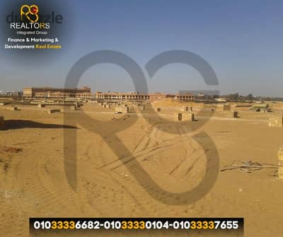 Two plots of land, totaling 80 feddans, for sale in Dahshur Link, at the intersection of the Dahshur Link and the Desert Road in Sheikh Zayed.