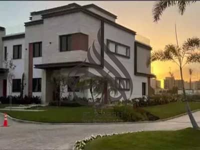Town house middle for sale in Azzar 2 New Cairo prime location under market price with down payment and installment