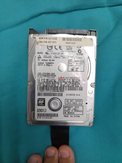 HGST Travelstar Z7K500 320GB 2.5-inch internal hard drive.