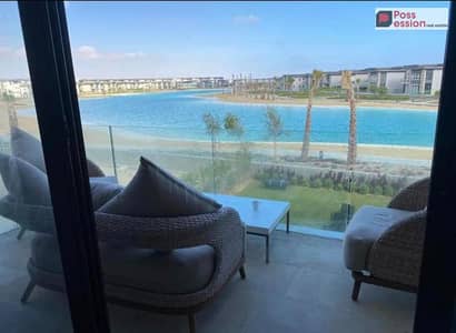 3-bedroom chalet with a private garden for sale in Ras El Hekma EL Masyaf Ras Elheikma, prime location on the lagoons, near the hotel,