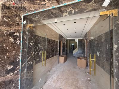 Apartment for sale, first floor, balcony with an open garden view in a prime location next to all services, with 50% down payment and 18-month installment plan, 3 rooms, 3 bathrooms