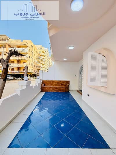 Ground floor apartment with private entrance in Alexandria, Al Nakheel Beach, Agami, Sixth building from the sea, cash or installment