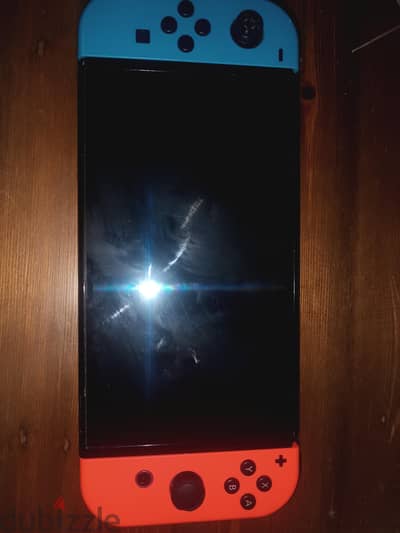 Nintendo switch in almost perfect condition with a bunch of games