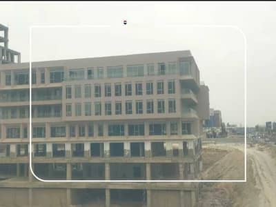 Office for rent in Sheikh Zayed, in a prime location on the 26 July Corridor, available in various sizes