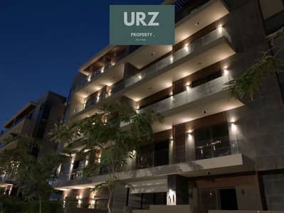 فرصة للاستثمار او السكن شقة 124 م موقع open view بالقتسيط او بخصم فوري للبيع علي طريق السويس مباشرة بالقرب اموردا و جايد ولايان في سراي ودقائق من AUC