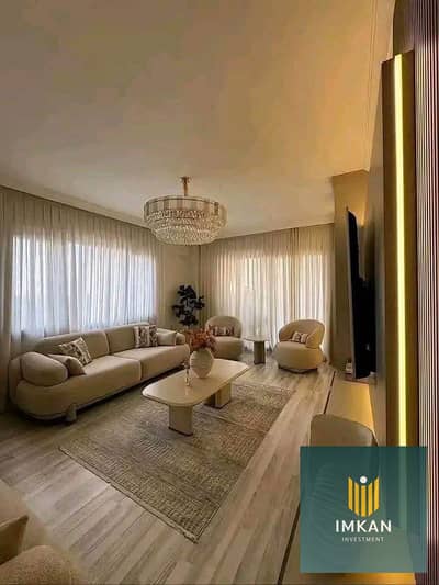 **Fully finished apartment for sale in Al Burouj Compound, El Shorouk, featuring a premium landscape and lagoon view, with interest-free installments