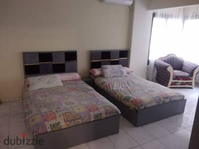 Apartment for rent furnished in a prime location on Makram Ebeid, in front of Serag Mall, clean furnishings