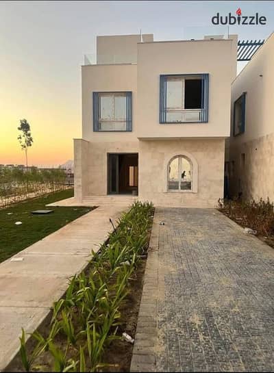 Ready-to-move-in standalone villa with a swimming pool in Naya Bay, featuring luxurious finishes in Ras El Hekma's prime location with a sea view.