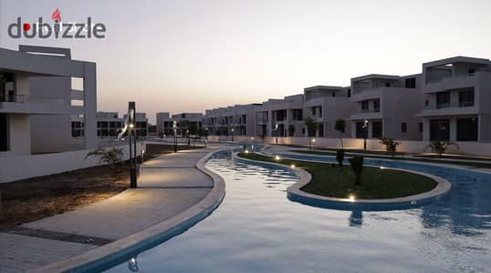 Ready-to-move-in standalone villa in Lake West Compound, located on the Dahshur Link Road, opposite the entrance to Old Sheikh Zayed City, near Arkan