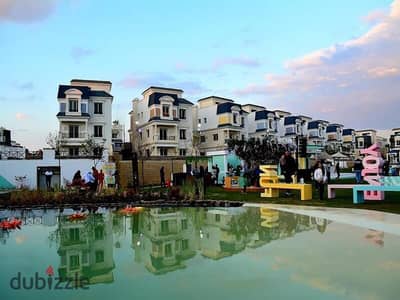 Townhouse for sale in Chill Out Park compound at an attractive price with down payment and remaining installments. Features a distinctive landscape vi