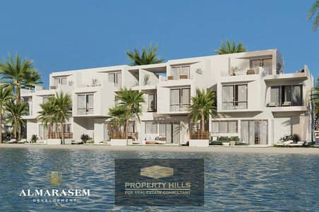 Fully finished townhouse with air conditioning and kitchen in Mar Bay Compound, Ras Al-Hikma, Al-Marasim Company, near the Emirates Cities