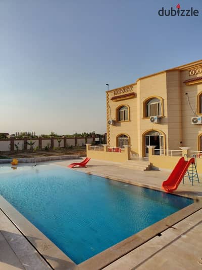 Villa on 4200m for sale in the European countryside finished with a swimming pool on the Cairo-Alexandria Desert Road