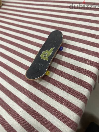 Rare tech deck fingerboard with custom wheels and grip tape