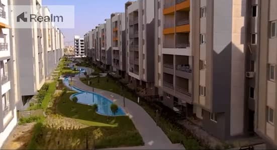 2 bedroom apartment on Al-Wahat Road in front of MSA University & installment up to 10 years