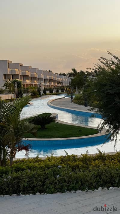 Own a corner townhouse for sale, 255m² built area and 268m² land area, in Lake West 3 Compound, Basin 1. Delivery in two years.