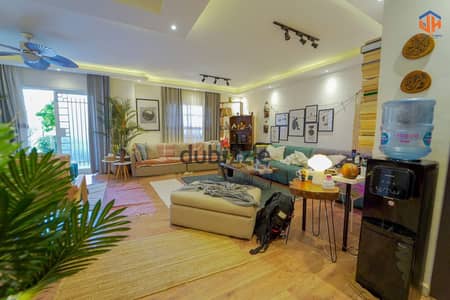 Apartment for sale with private garden 50m super lux Sale includes kitchen and AC’s Ready to move in 150m prime location easy viewings in Madinaty B10