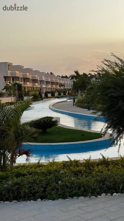Corner townhouse for sale in Lake West Compound 4, Basin 3, area 235m², delivery in two years