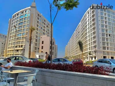 شقه ١٦٠ م للبيع فى كمباوند وان قطاميه نصف تشطيب برج مميز تكمله اقساط
