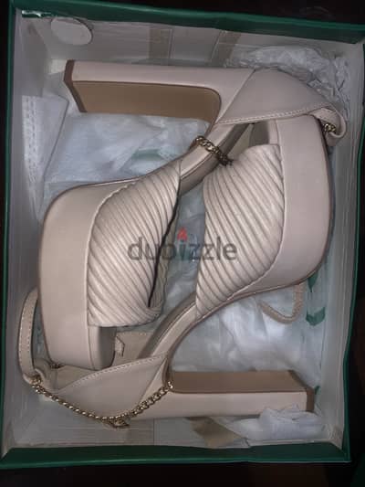 Beige pixi heels