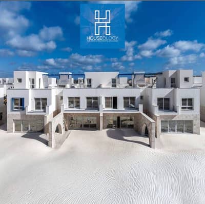 Immediate receipt finished Townhouse direct on the sea for sale in Naia Bay Ras Al-Hikma - Naia Bay