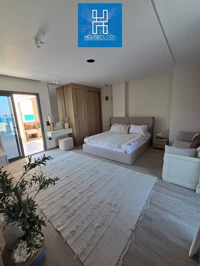 Installments over 10 years, Immediate delivery, Finished twin house direct on the sea for sale in Naia Bay, Ras Al Hikma - Naia Bay