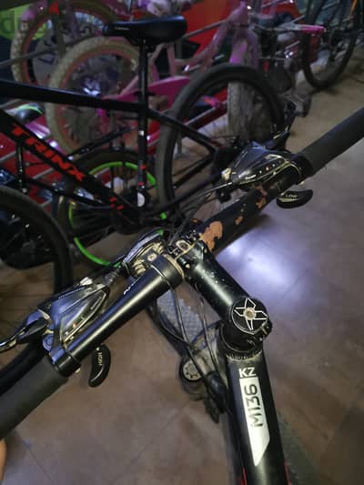 trinx m136