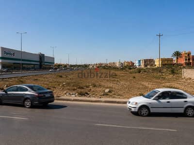 أرض مباني 450م بقها على الزراعي بجوار بنده