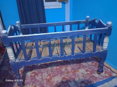 سرير اطفال خشب