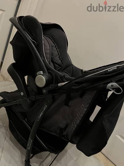 عجله أطفال ماركه Junior الأصلي ب Car seat حاله ممتازه