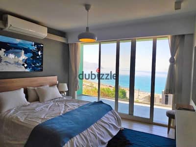 Two-bedroom chalet in a prime location, available for sale in installments over 10 years in Monte Galala Village - Ain Sokhna.