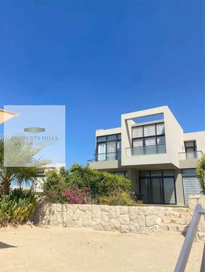 بسعر مميز و فيو لاجون شاليه في قلب كومباوند ازها الساحل الشمالي -Azha North Coast