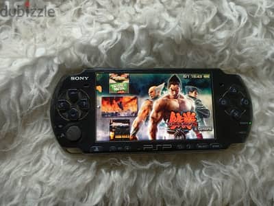 psp 3000 slim +لعبة300 +شاحن 64 جيجا +بطارية