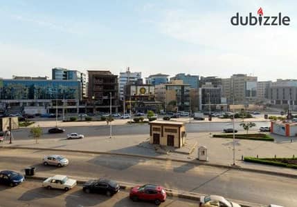 On the main road in a chic building with a violet view of the Kababgy Palace near Petro Sport Club, an apartment of 150m with an open terrace view, super lux.