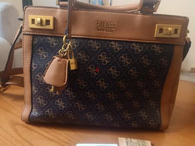 Guess Katey Original.  حالة ممتازة.  اللون Brown/Cognac.