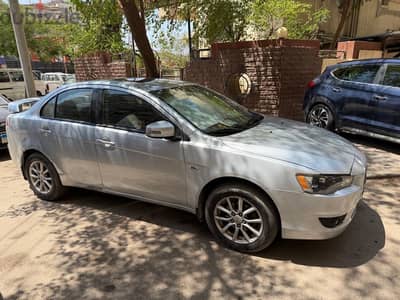 Mitsubishi Lancer 2015 الفئة الرابعة full option ماعدا بصمة