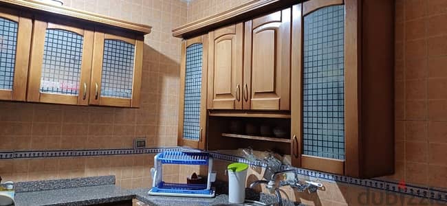 مطبخ خشب زان للبيع ممكن التجزئه و ممكن كله على بعد