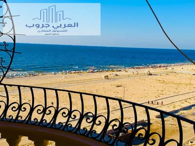 شقه تاني عماره من البحر في العجمي شاطئ النخيل بسعر مغري جدا جدا شامل الخدمات