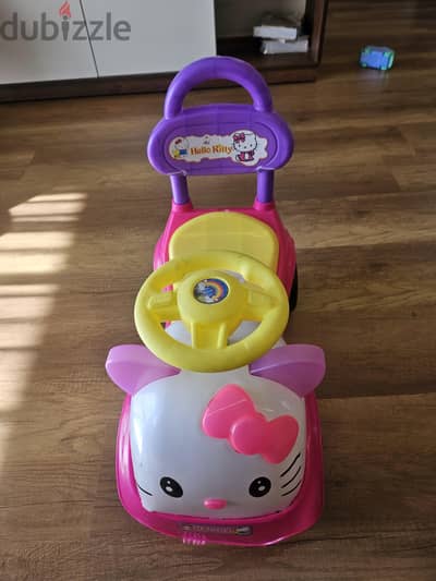 Hello kitty ride along.  plays songs.