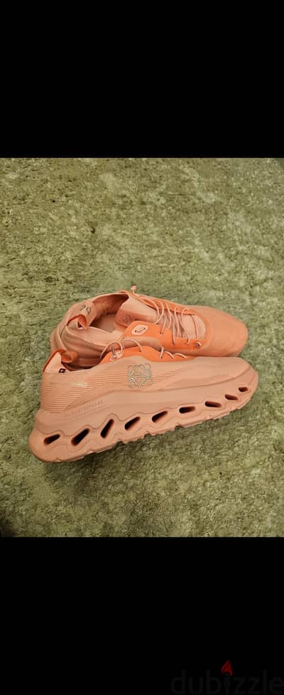OC/lowe  TRAINERS IN PINK.   SIZE 40.