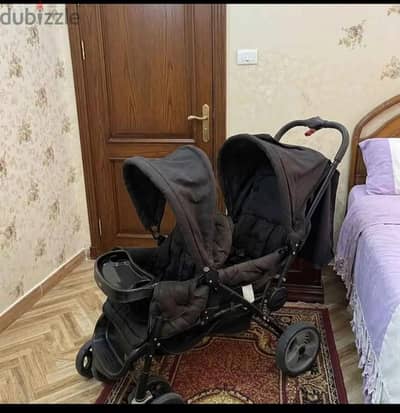 عربية اطفال مزدوجة بحالة ممتازة