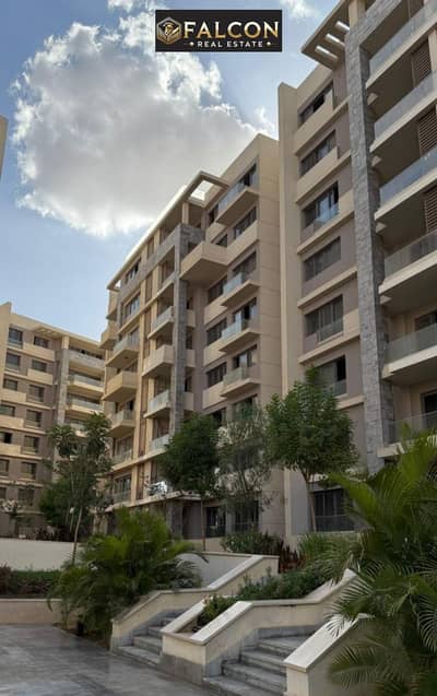 Recieve immediately A RTM 2BR Ap. in its Half Price , Beside Deplomatic District Direct On Green River % the 90's St. in Venci New  Capital