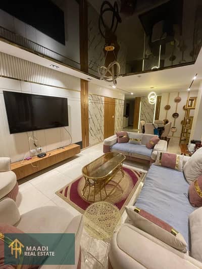 Furnished hotel apartment for rent, first occupancy, in the heart of Sarayat El Maadi, prime location, very low price, close to all services.