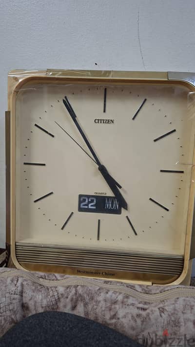 ساعه حائط citizen