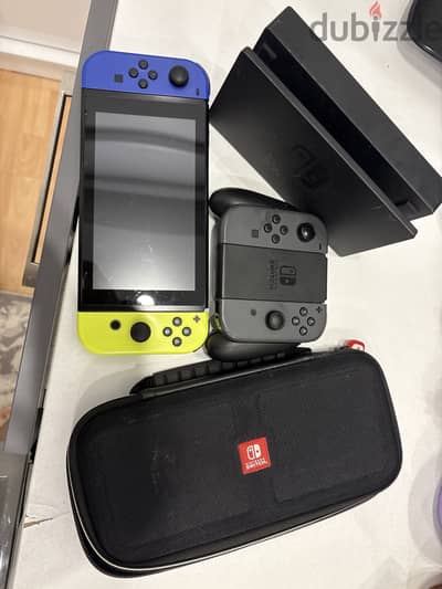 Nintendo switch with charger and controller and bag