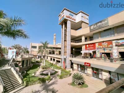محل 56م بمول جوهرة اكتوبر دبل فيس ناصيه بحدائق اكتوبر