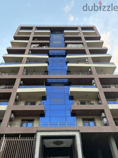 شقة لقطة في عمارة فندقية و موقع متميز بميدان هليوبوليس مصر الجديدة