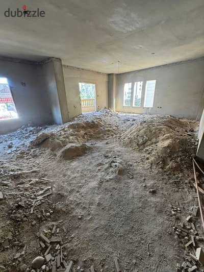 Apartment for sale in the second neighborhood east at a bargain price, second floor, semi-finished in a chic villa