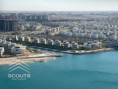 Apartment for sale in El Alamein with a direct view of El Alamein Lake, high-end finishing, in New Alamein City and the North Coast, Mazarine
